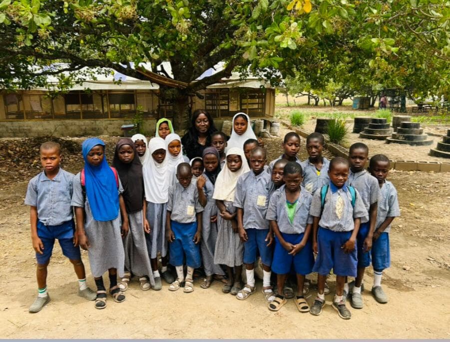 School group touring the farm